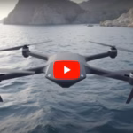 ALT: "Drone stealth TALAY di Solid Aero in volo a bassa quota sul mare - innovazione tecnologica nel settore aerospaziale."
