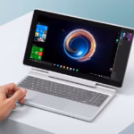 ALT: "OneXPlayer X1 Air: console portatile 3-in-1 con Windows 11 e hardware Intel, ideale per gaming e produttività."